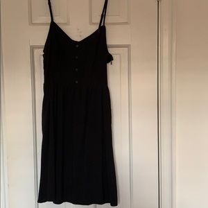 Divided black button dress